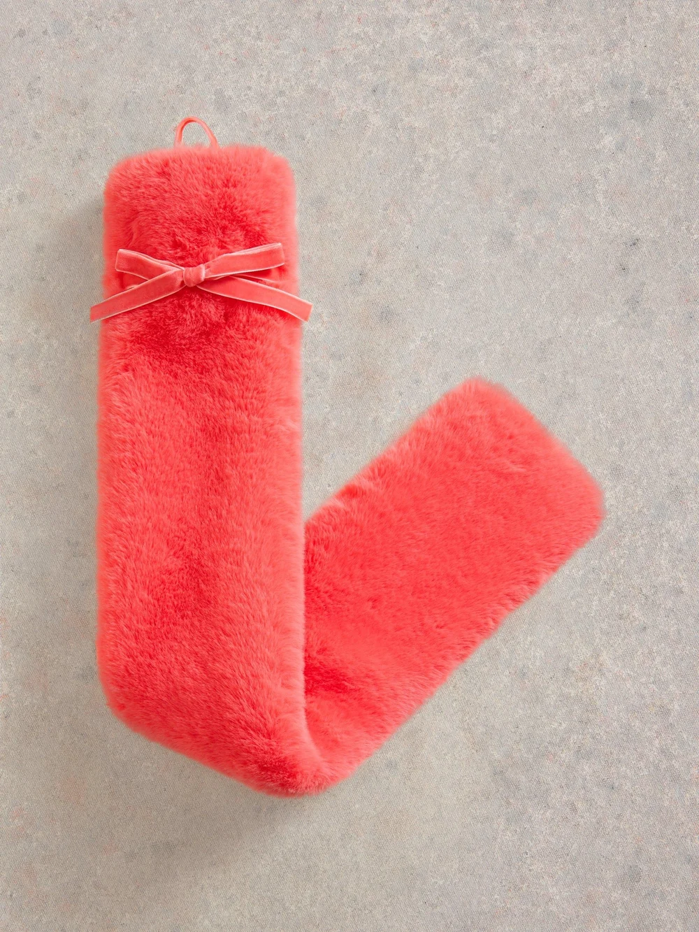 Lange Wärmflasche mit Webfellbezug Bild 1