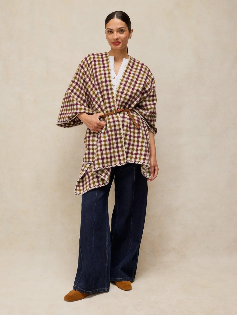 Karierter Poncho Bild 1